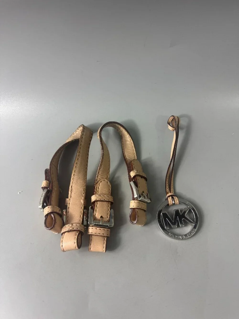 A Bundle of Michael Kors Tan Leather Double Straps w/ Silver-tone MK Logo Charm